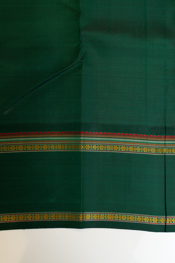 Cream and green rettai pettu pure Kanchipuram silk saree