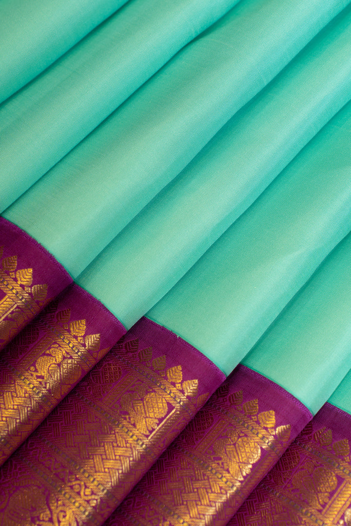 Turquoise blue and purple  pure Kanchipuram silk saree