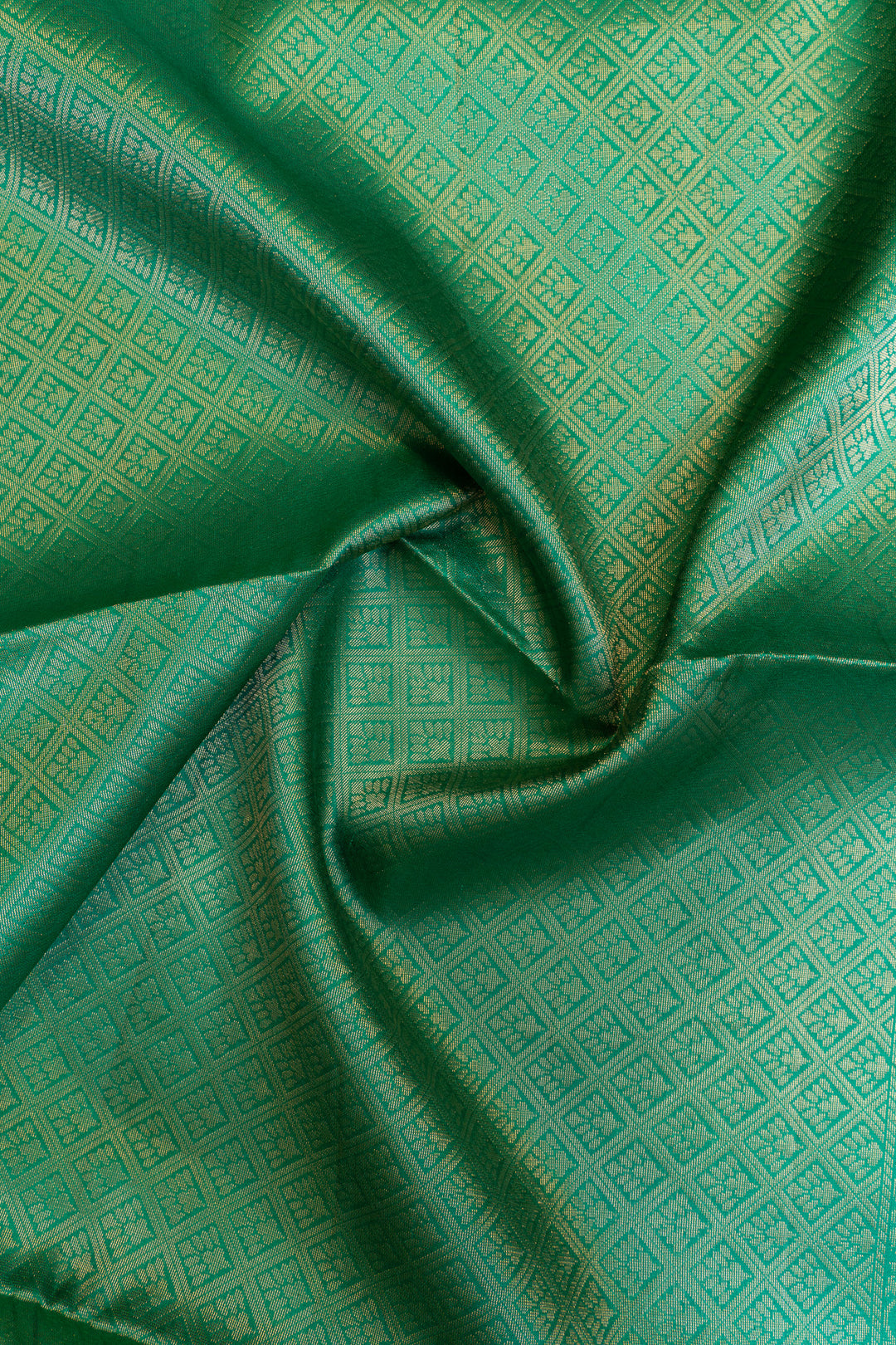 Close-up of green fabric with a subtle pattern