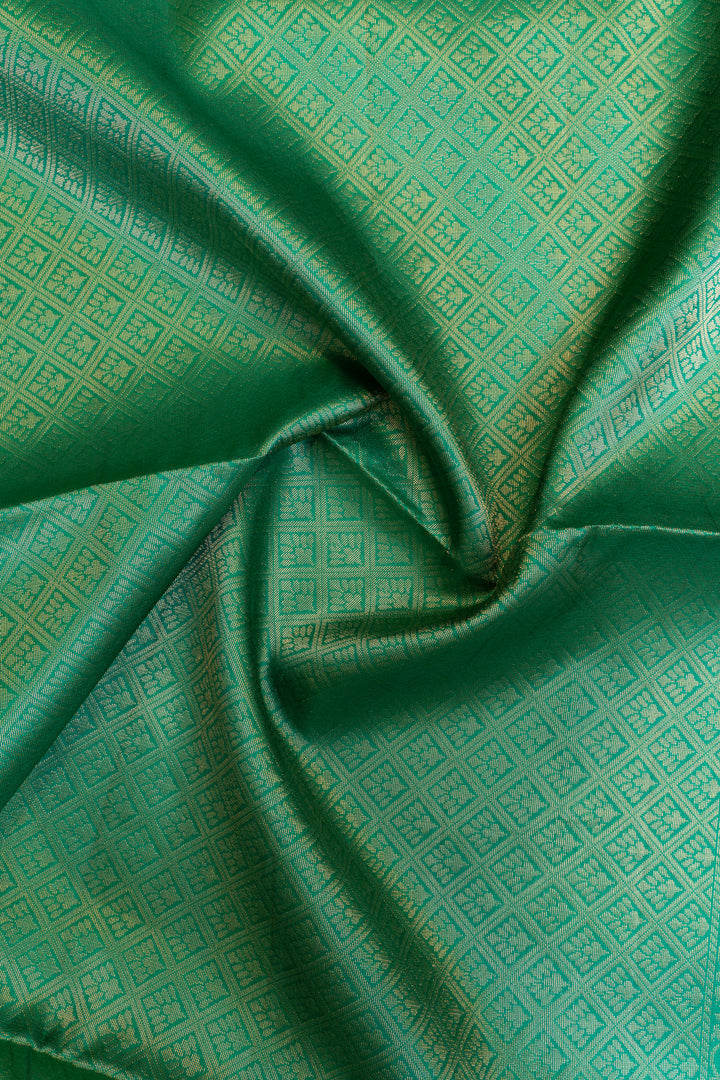 Close-up of green fabric with a subtle pattern