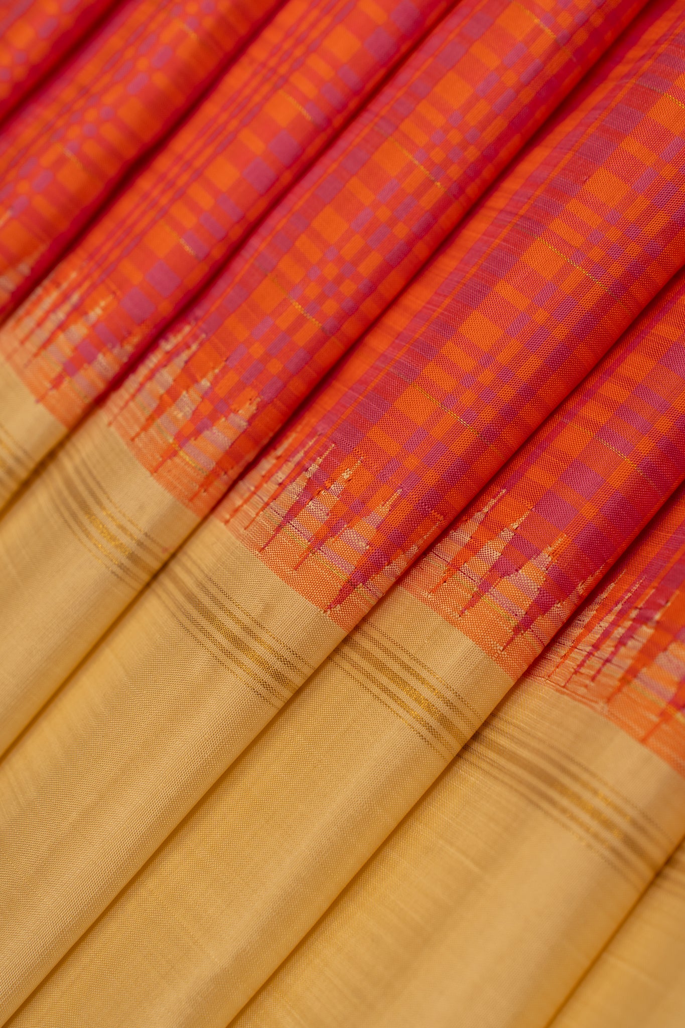 Orange and magenta checks pure zari Kanchipuram silk saree