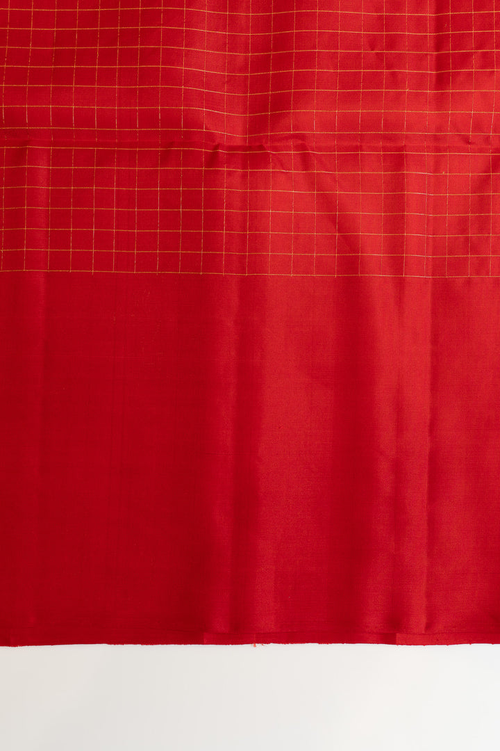 Red fabric with a grid pattern on a white background