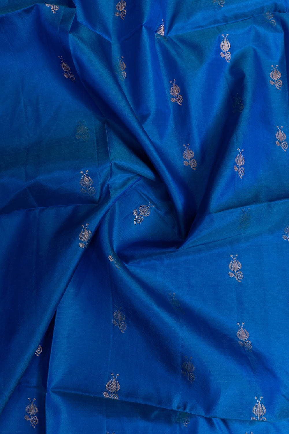 Close-up of blue fabric with subtle patterns