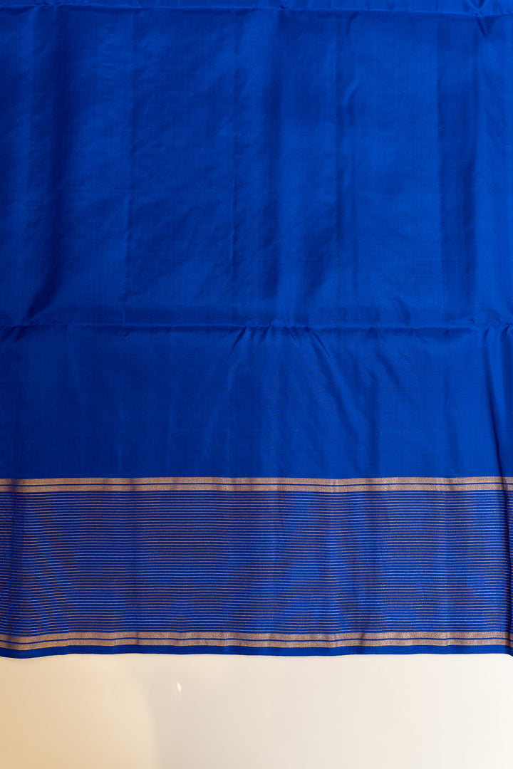 Blue fabric with a subtle pattern on a plain background