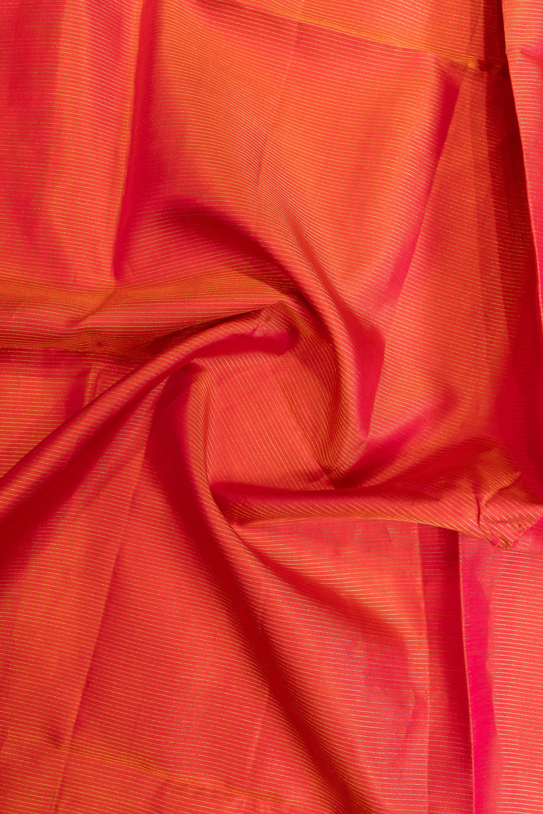 Close-up of pink fabric with a subtle pattern