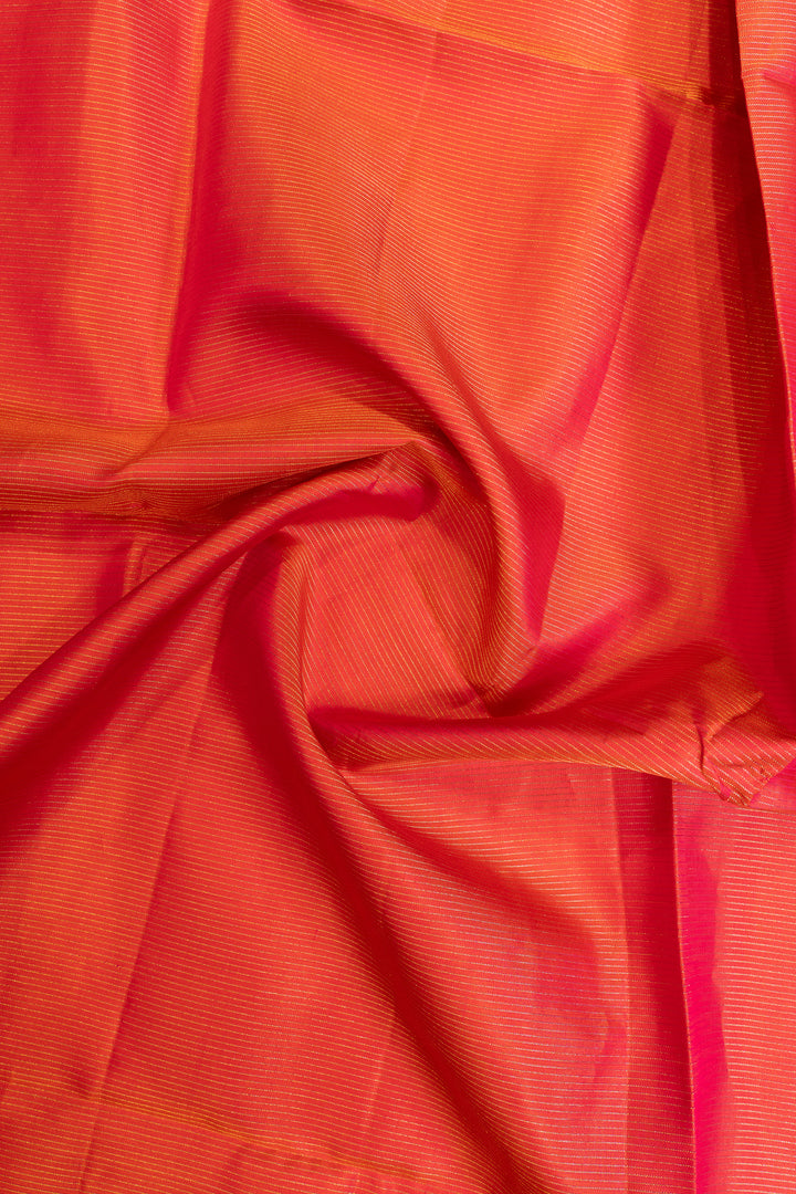 Close-up of pink fabric with a subtle pattern