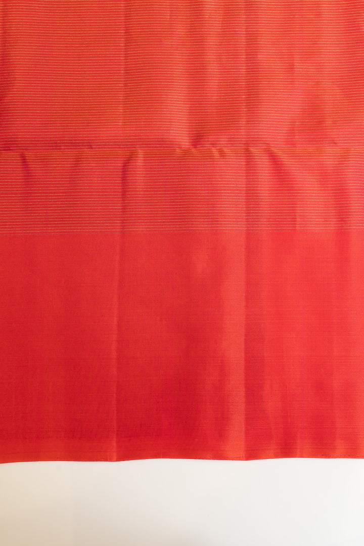 Red fabric with a subtle pattern on a white background