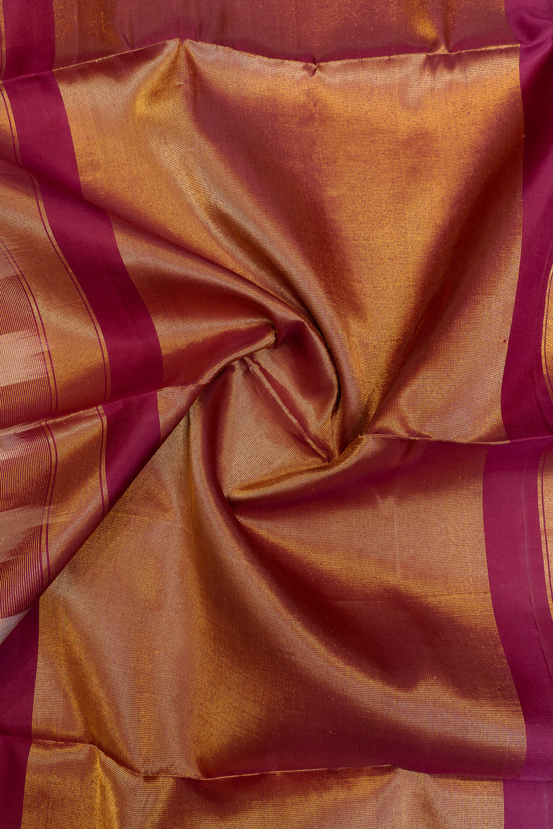 Close-up of a brown fabric with pink stripes