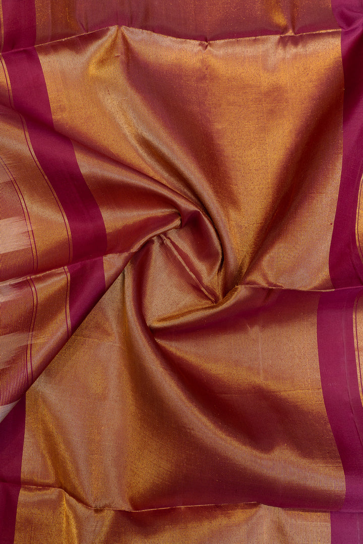 Close-up of a brown fabric with pink stripes