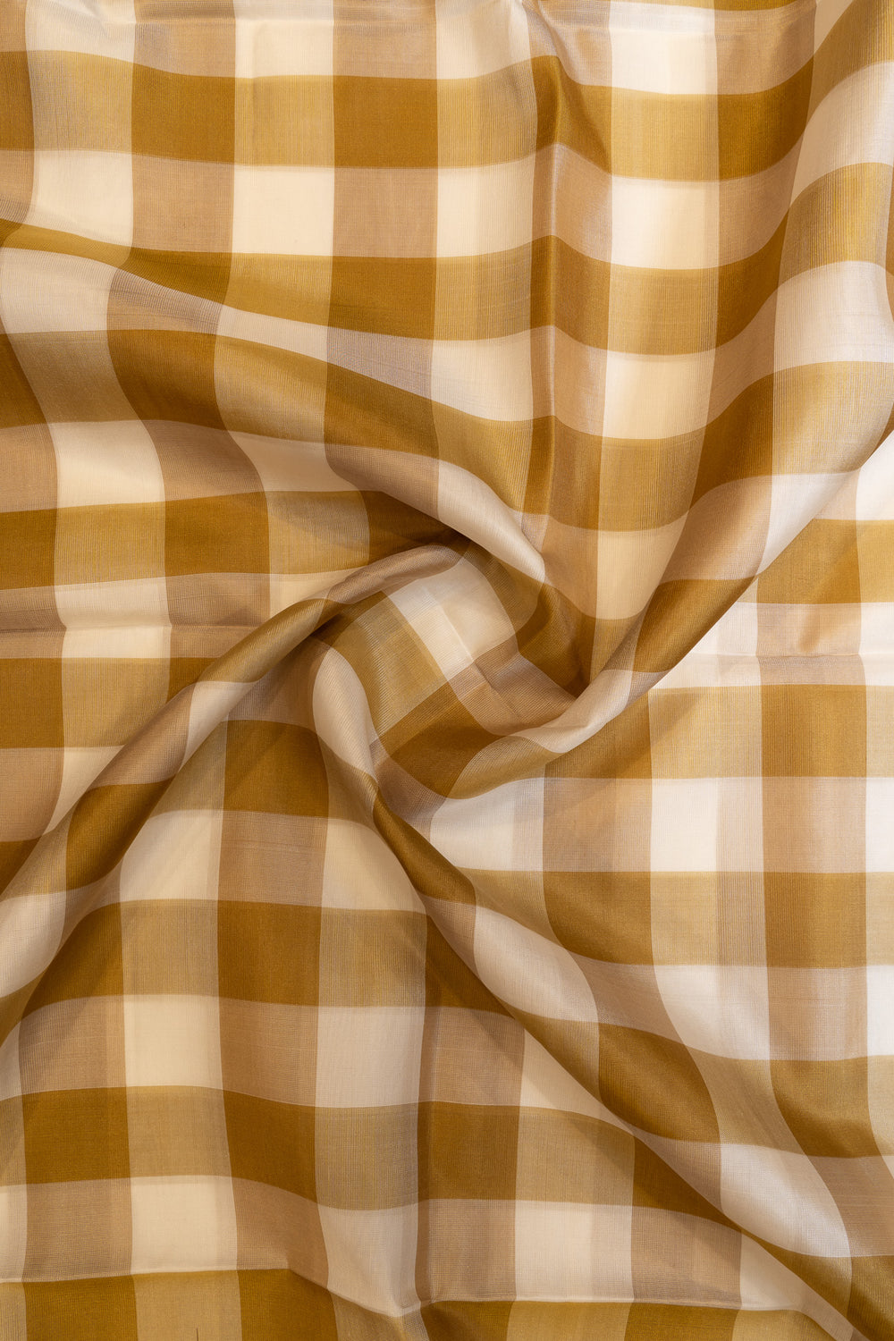 Close-up of brown and beige checkered fabric