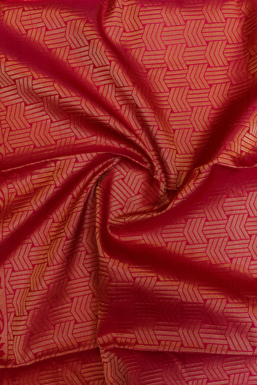 Red fabric with geometric pattern, possibly silk or satin