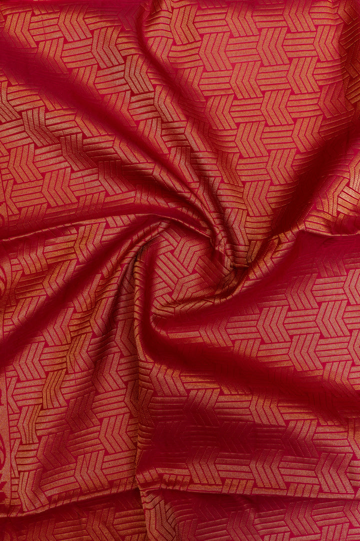 Red fabric with geometric pattern, possibly silk or satin