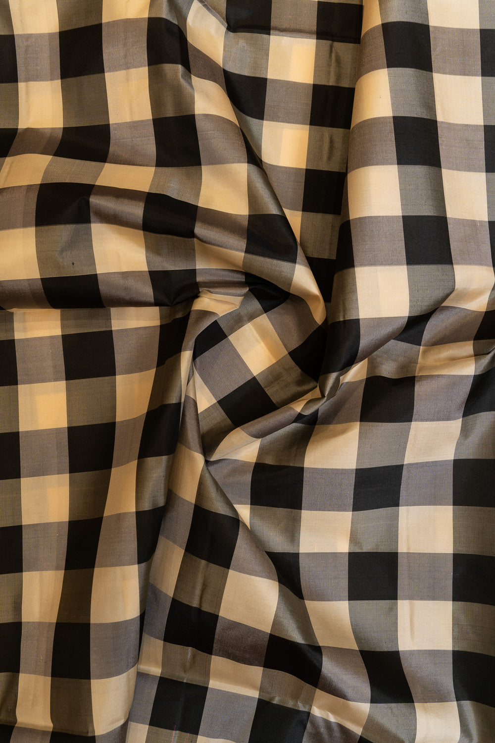 Checkered fabric with black and beige pattern