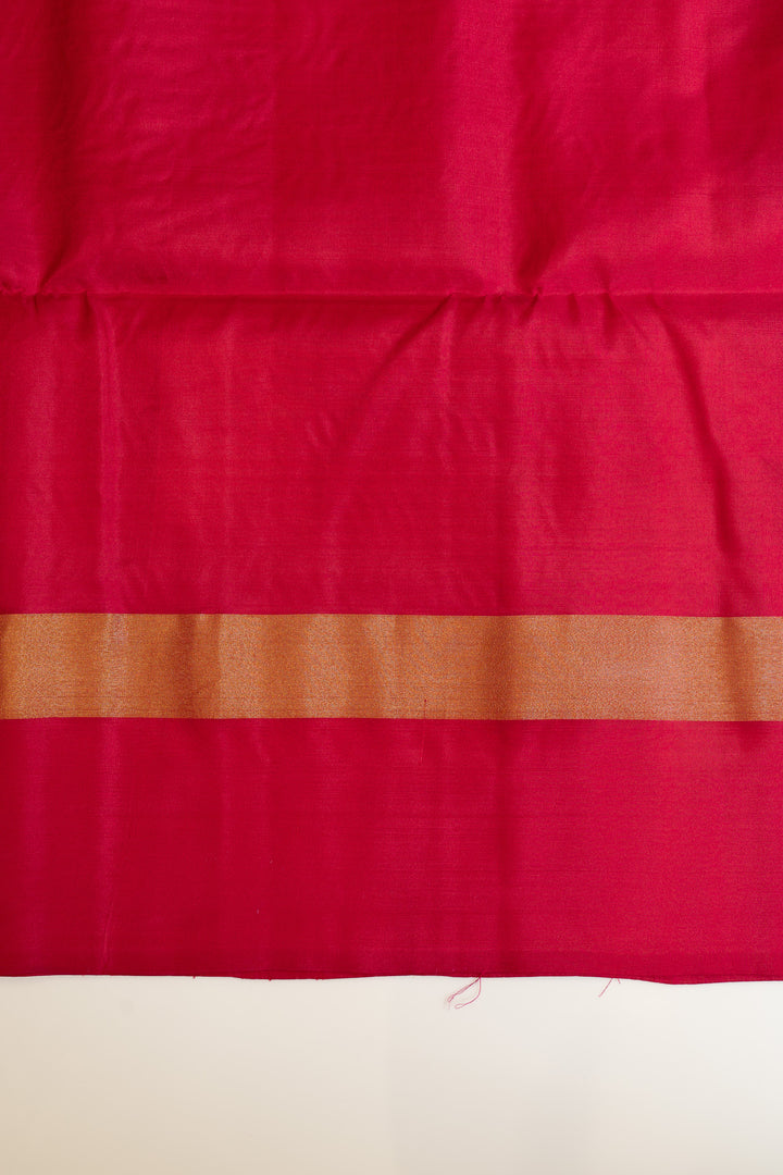 Red fabric with a brown band on a beige background