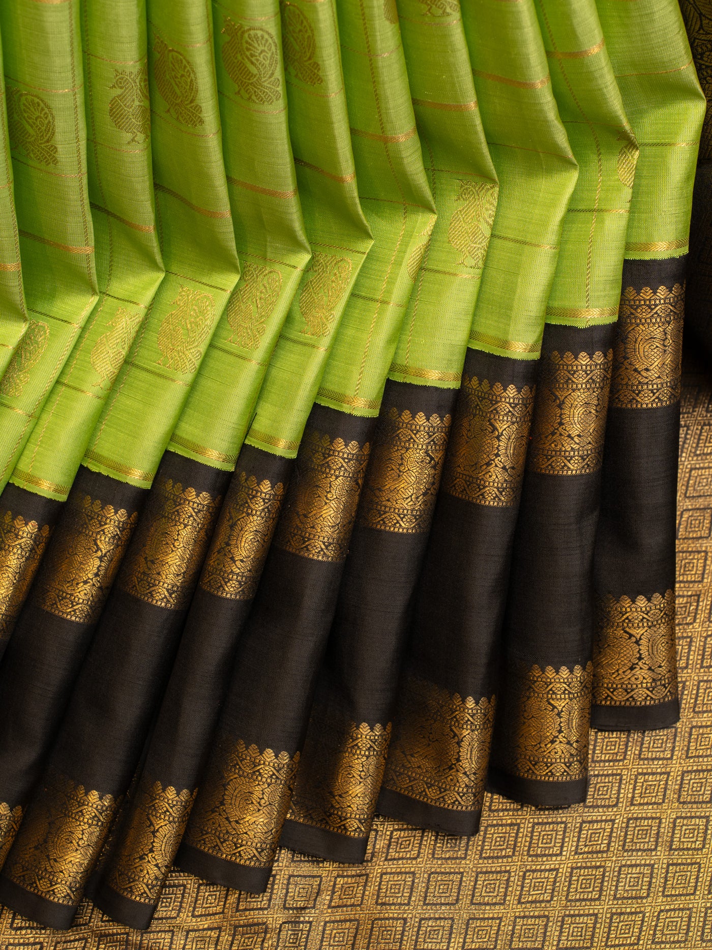 Chartreuse green and black pure zari Kanchipuram silk saree