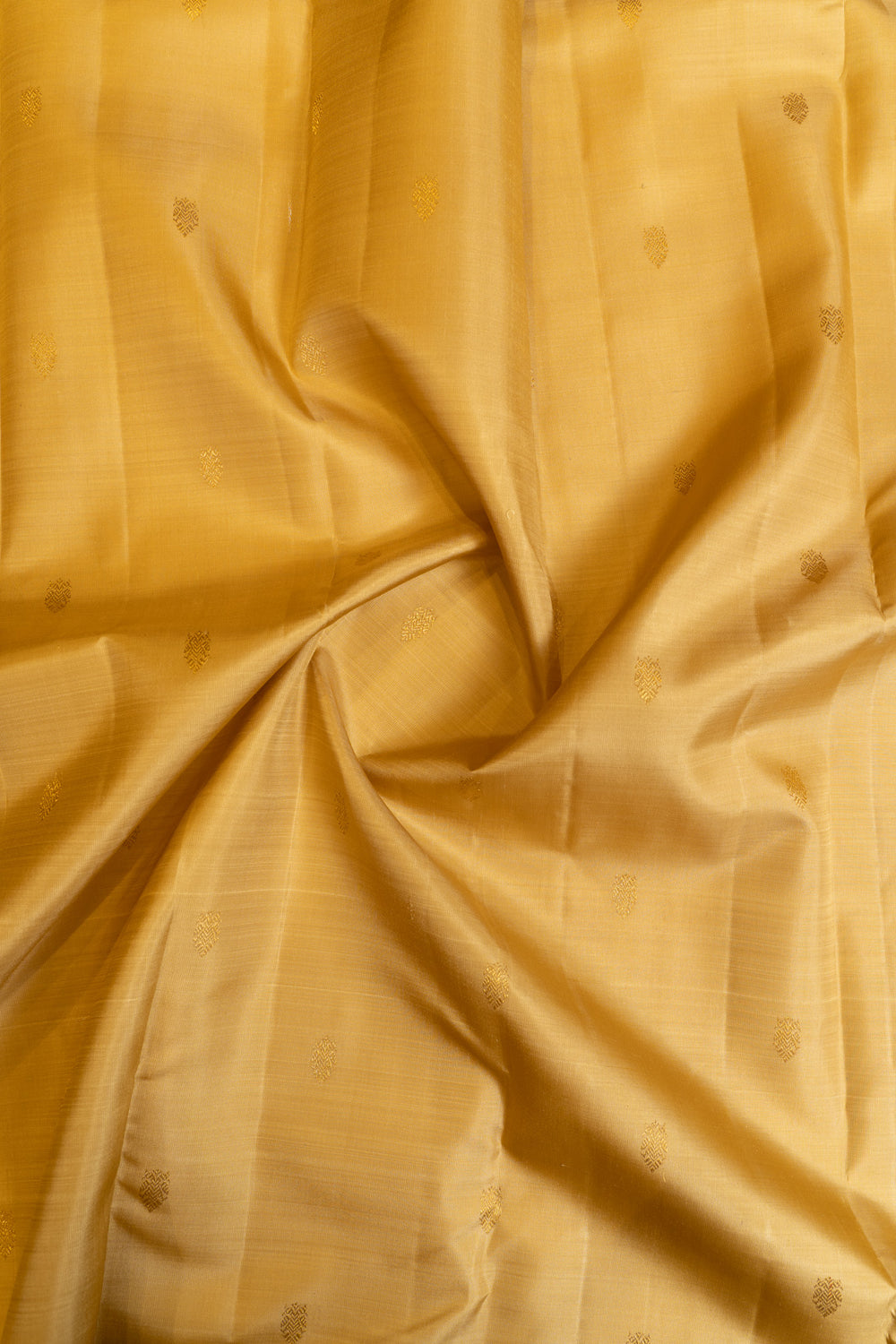 Beige and black iruthalaipakshi pure zari Kanchipuram silk saree