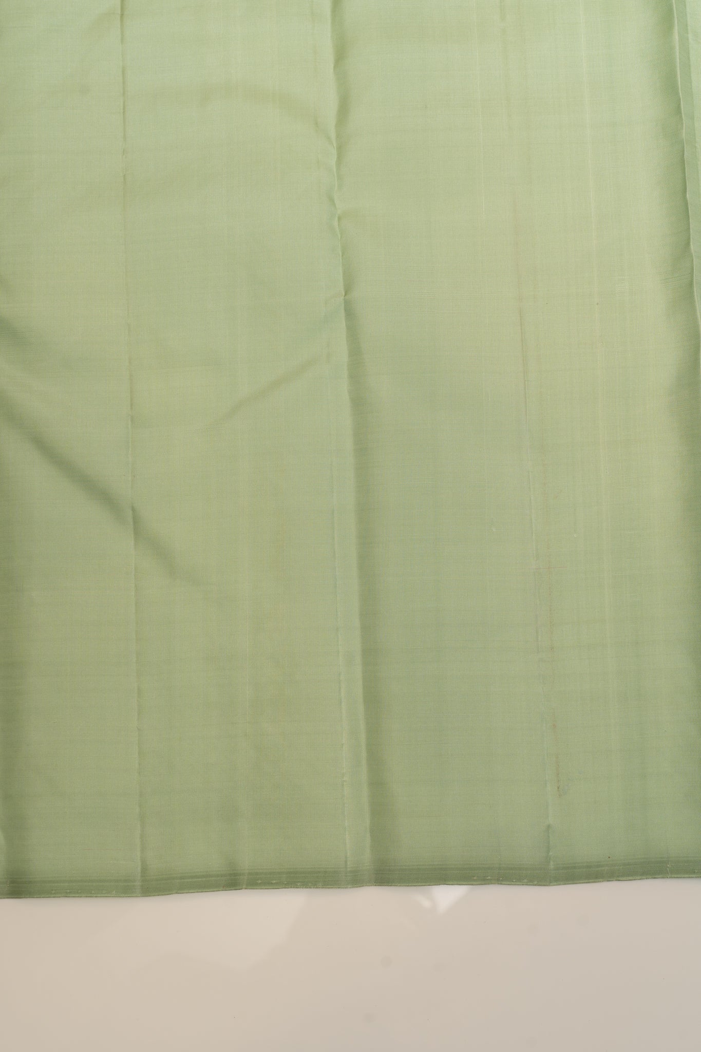 Pastel green borderless pure brocade Kanchipuram silk saree