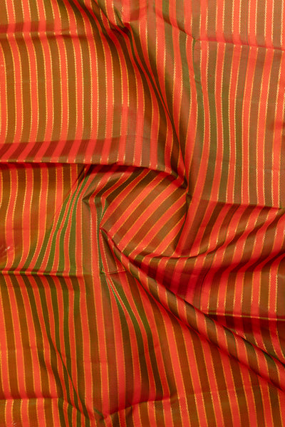 Rust orange and mandhulir green neli stripes pure zari Kanchipuram silk saree