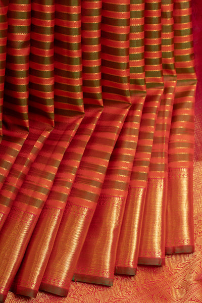 Rust orange and mandhulir green neli stripes pure zari Kanchipuram silk saree