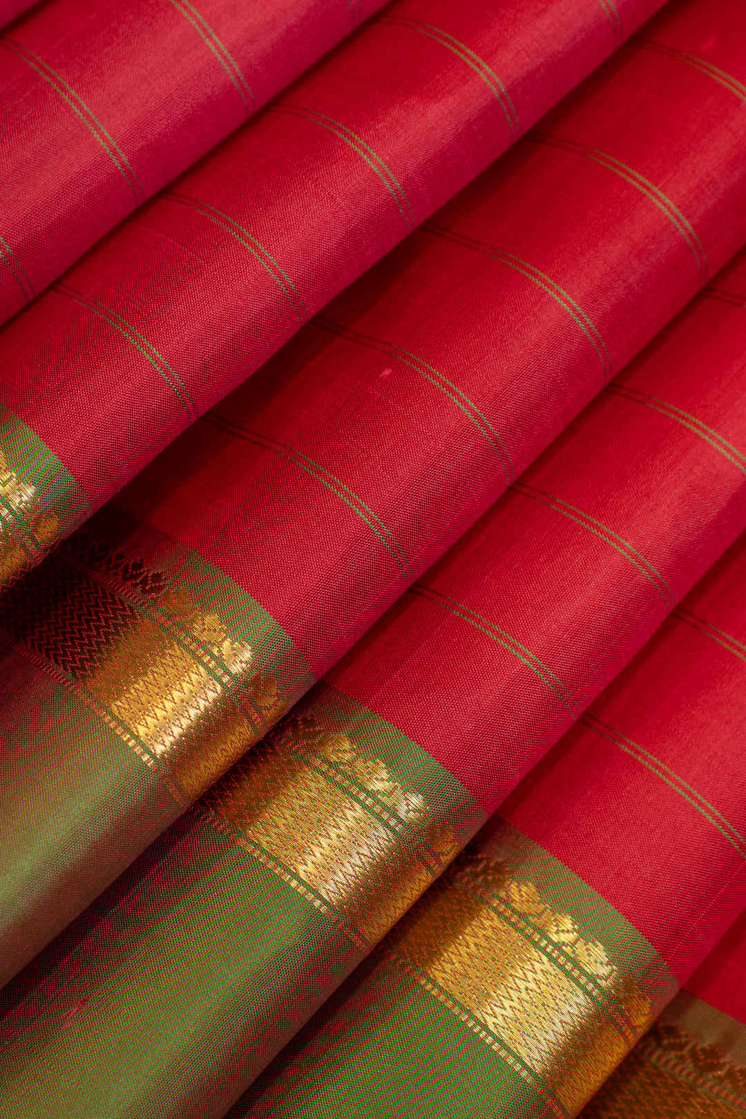 Reddish pink and green stripes pure silk saree