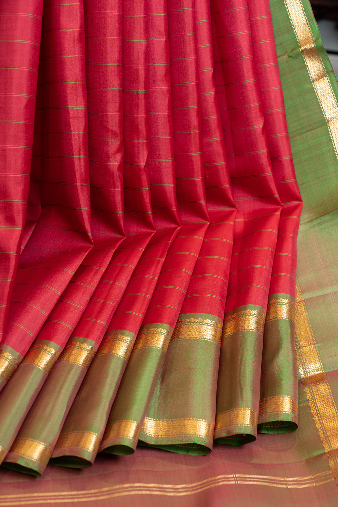 Reddish pink and green stripes pure silk saree