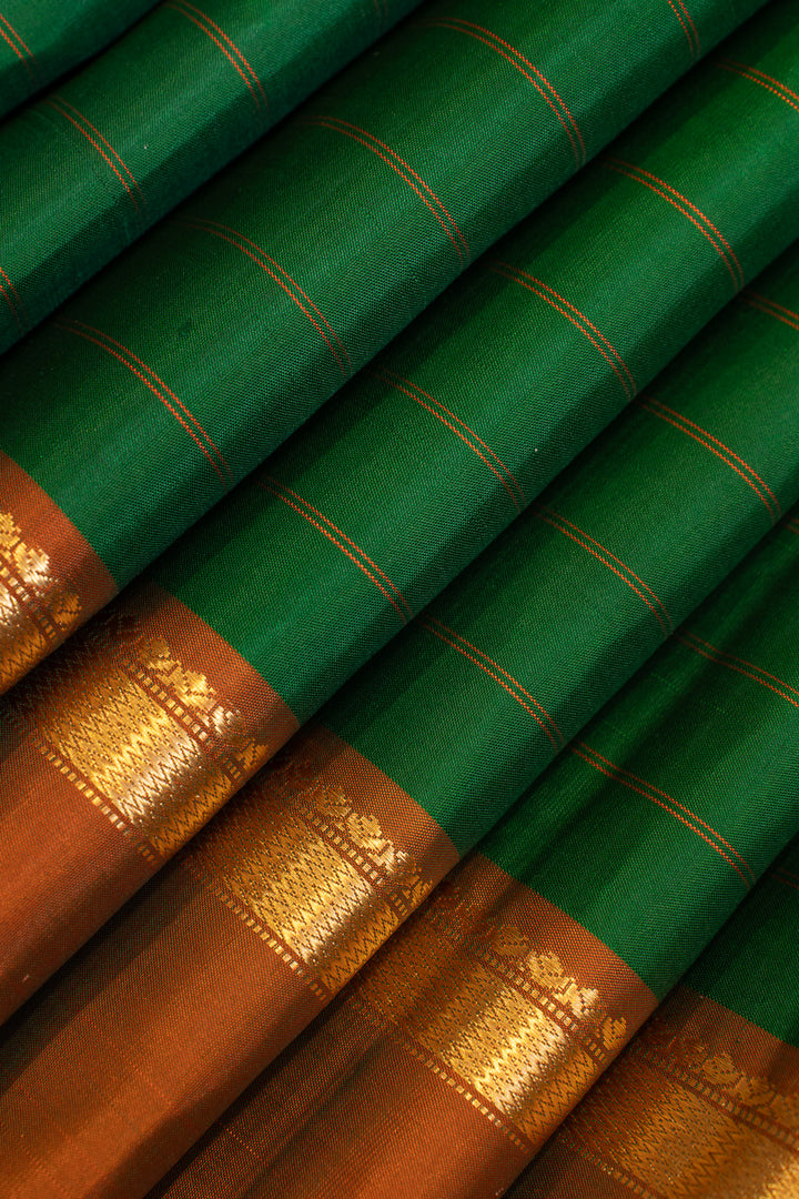 Bottle green and rust stripes pure silk saree