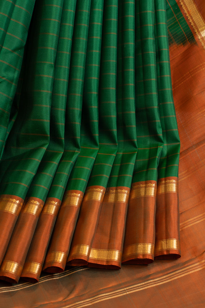 Bottle green and rust stripes pure silk saree