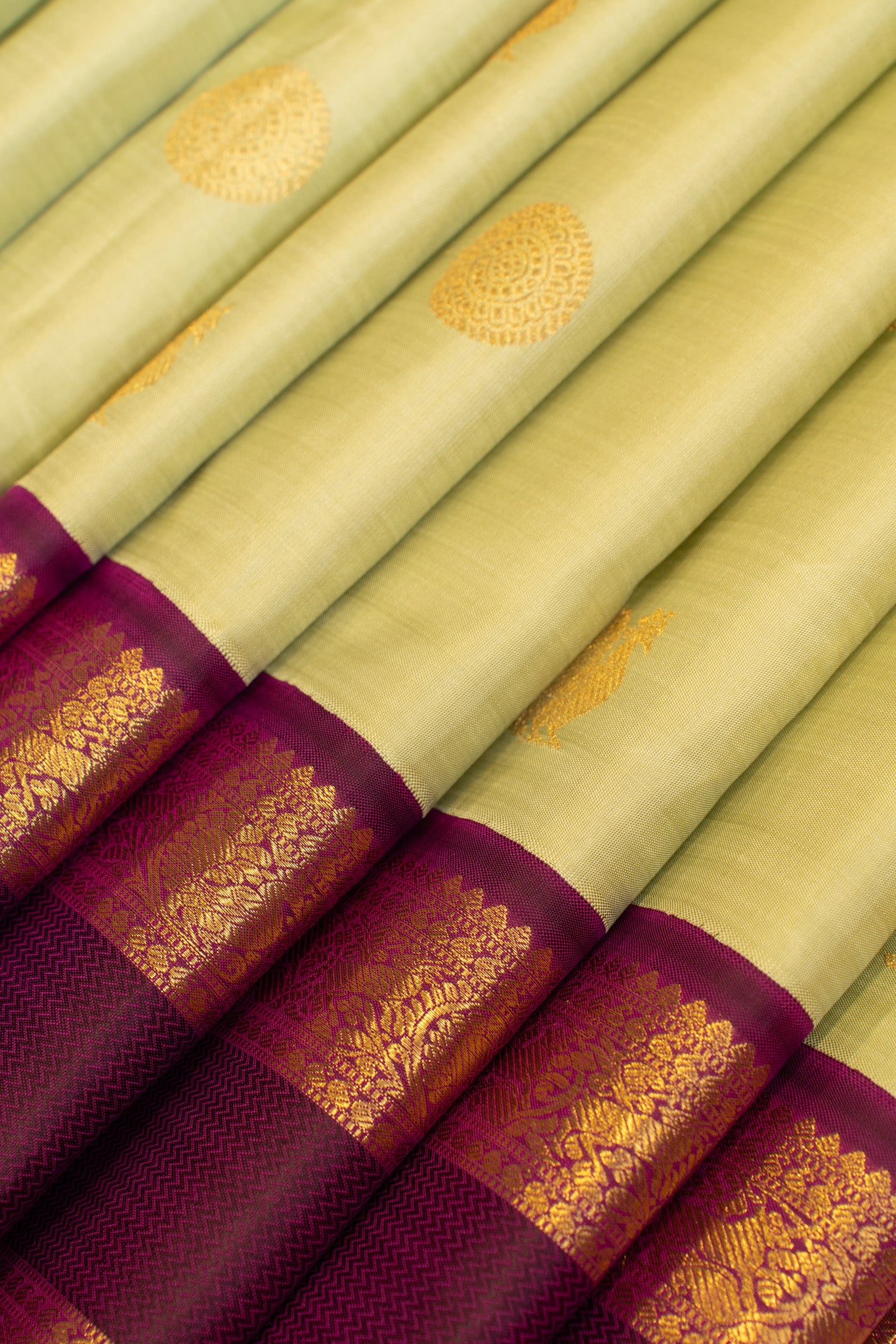 Elaichi green and purple pure zari Kanchipuram silk saree