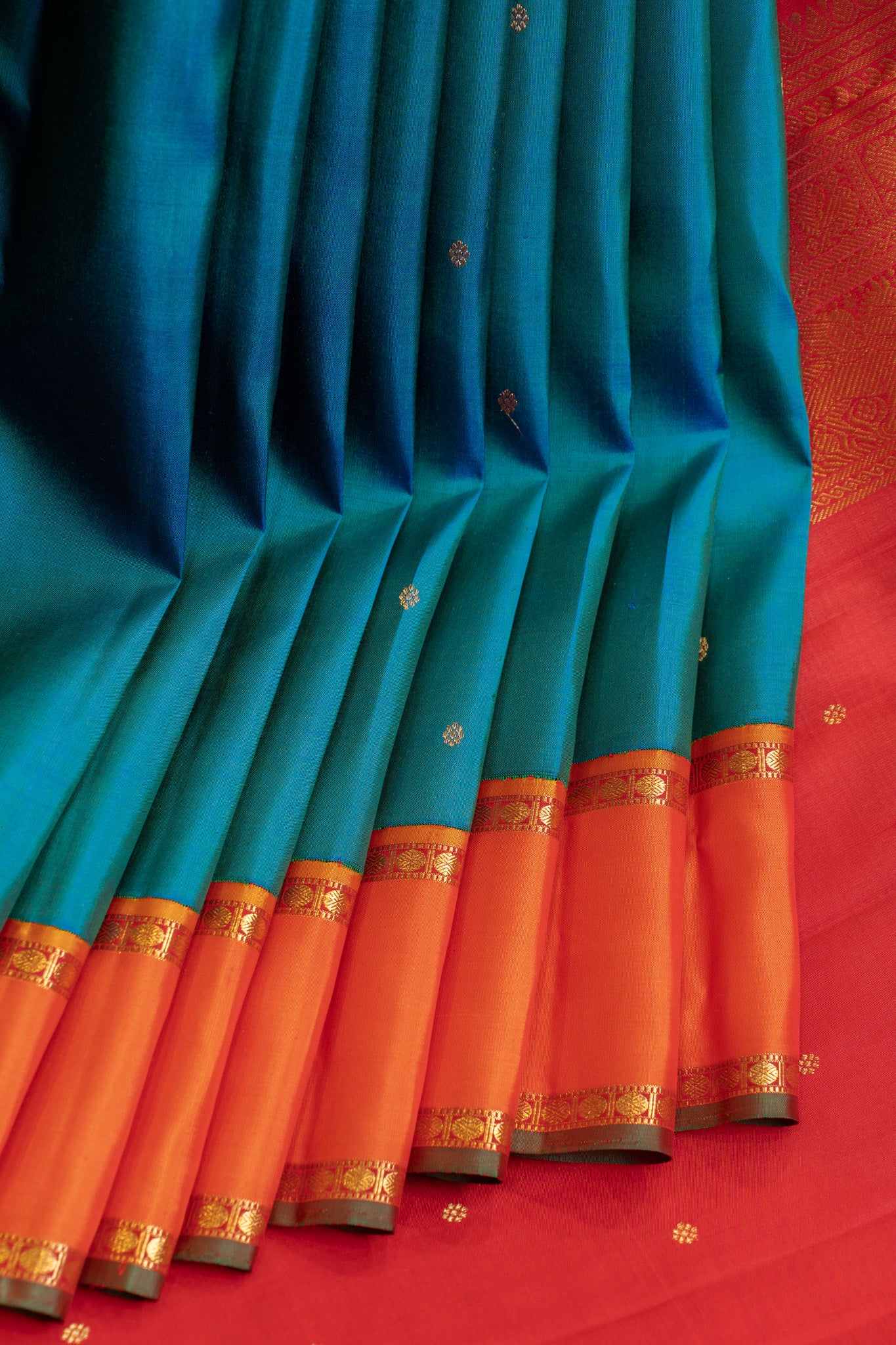 Peacock blue and orange pure zari Kanchipuram silk saree