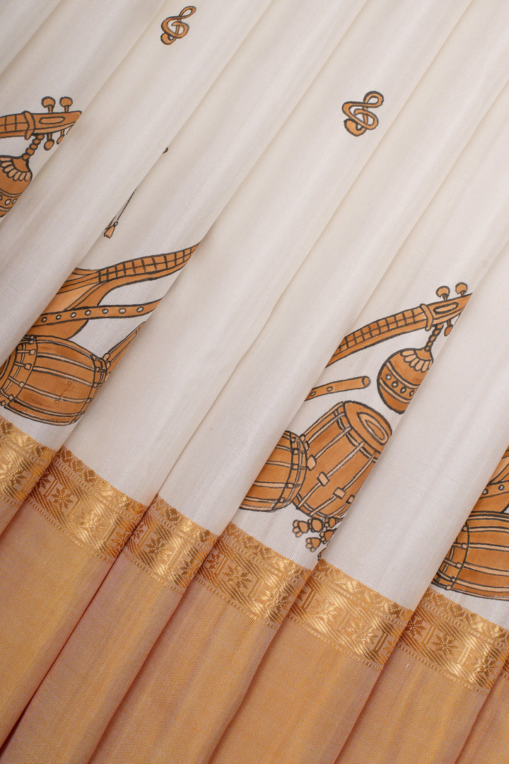 Pearl white and apricot peach handpainted pure kanchipuram silk saree