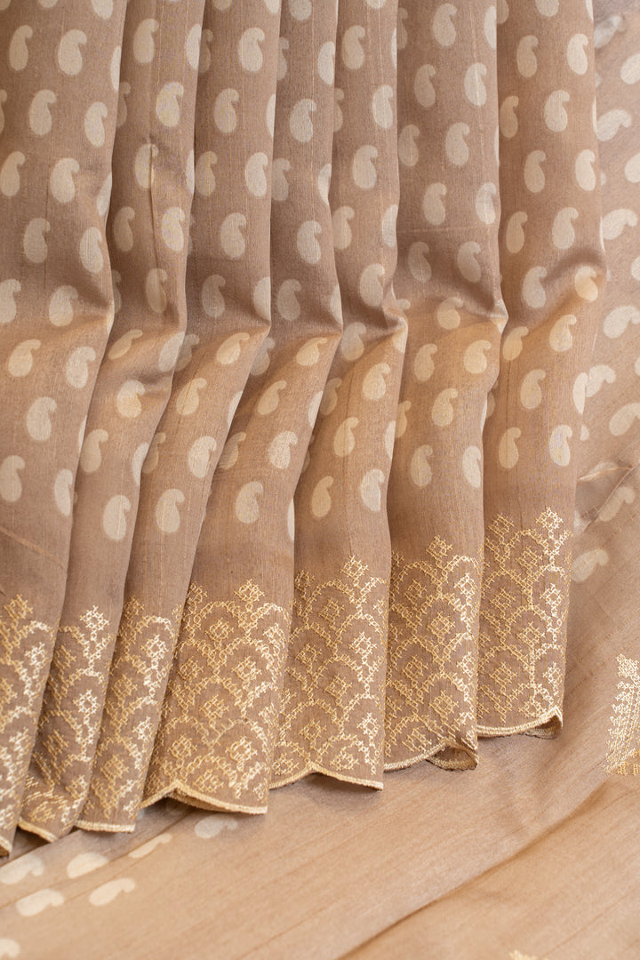 Beige mango printed embroidered border Tussar saree