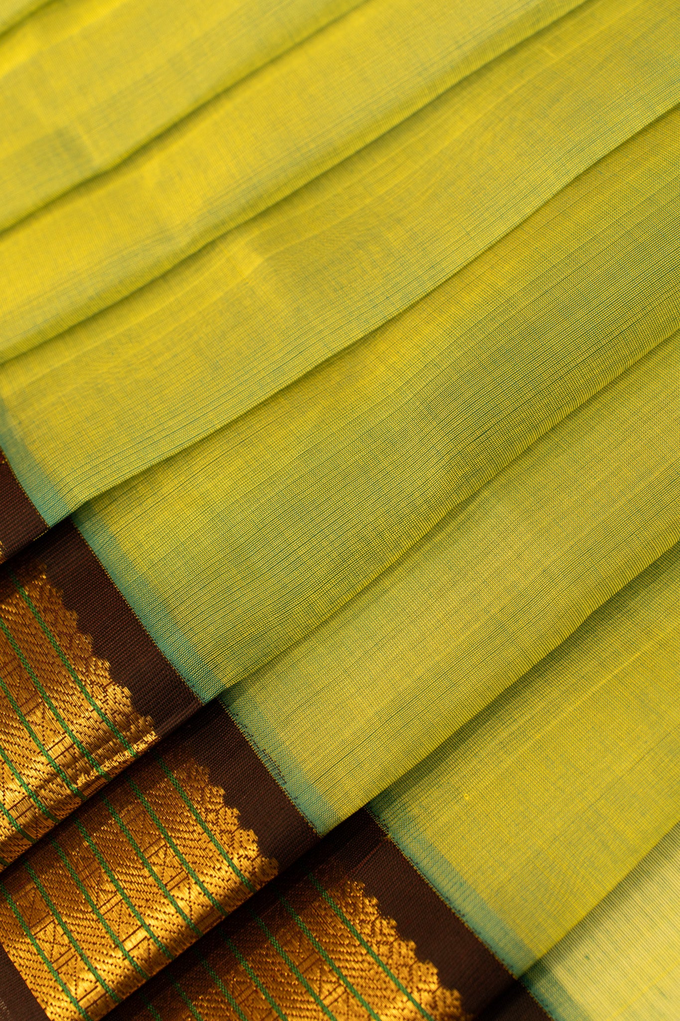 Recons green and brown pure silk cotton saree