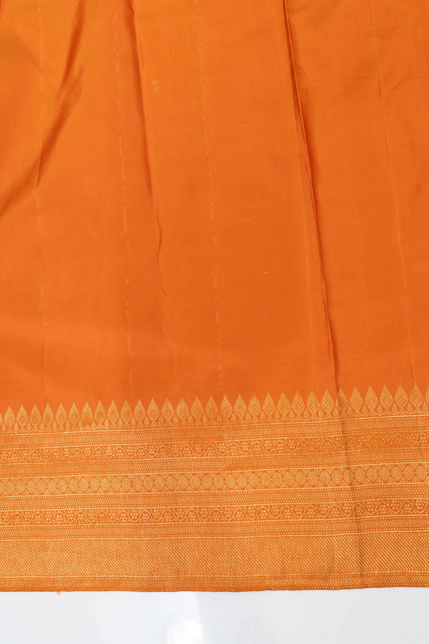 Rust orange floral brocade turning border pure Kanchipuram silk saree