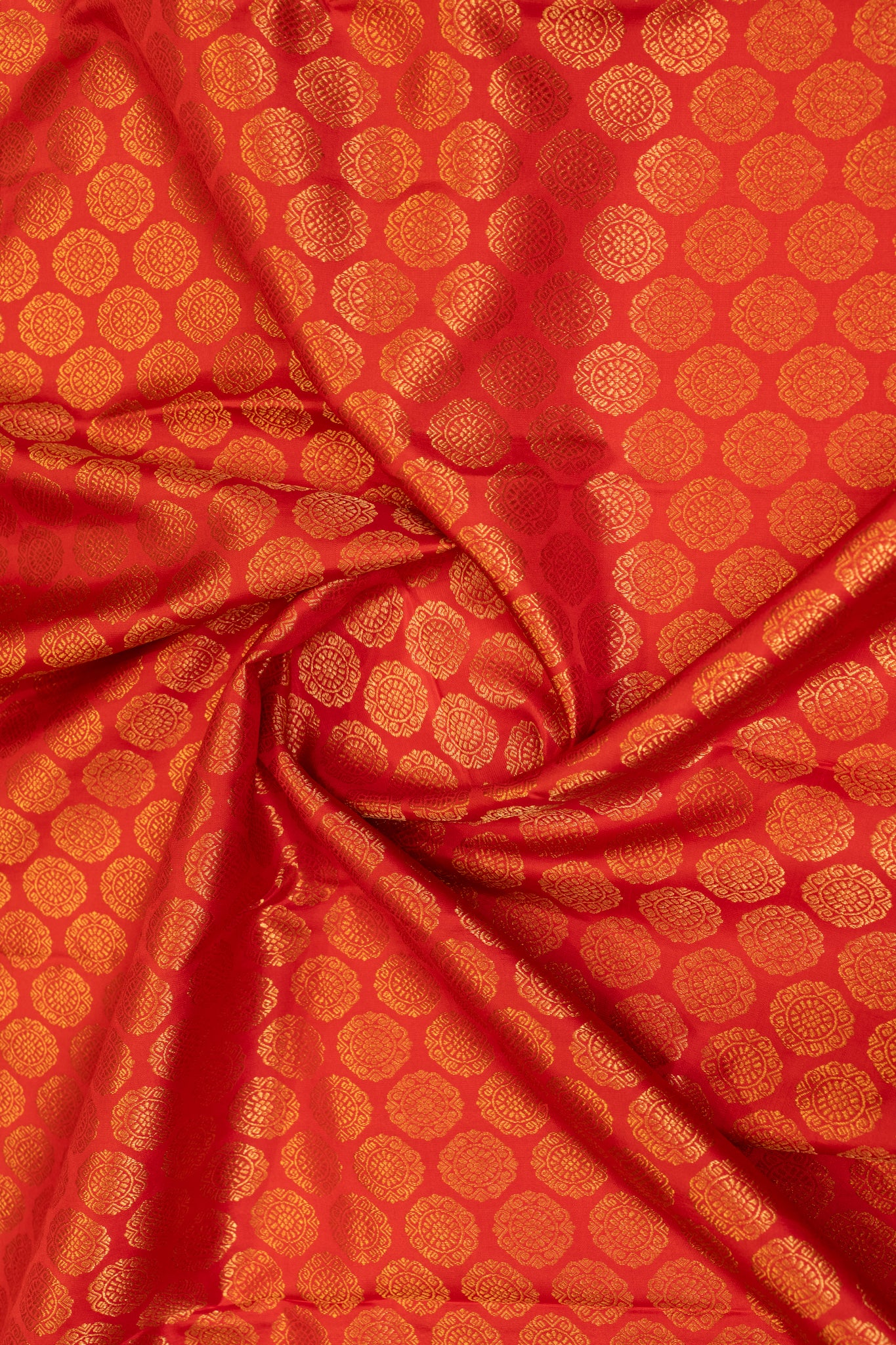 Reddish orange chakram brocade pure Kanchipuram silk saree