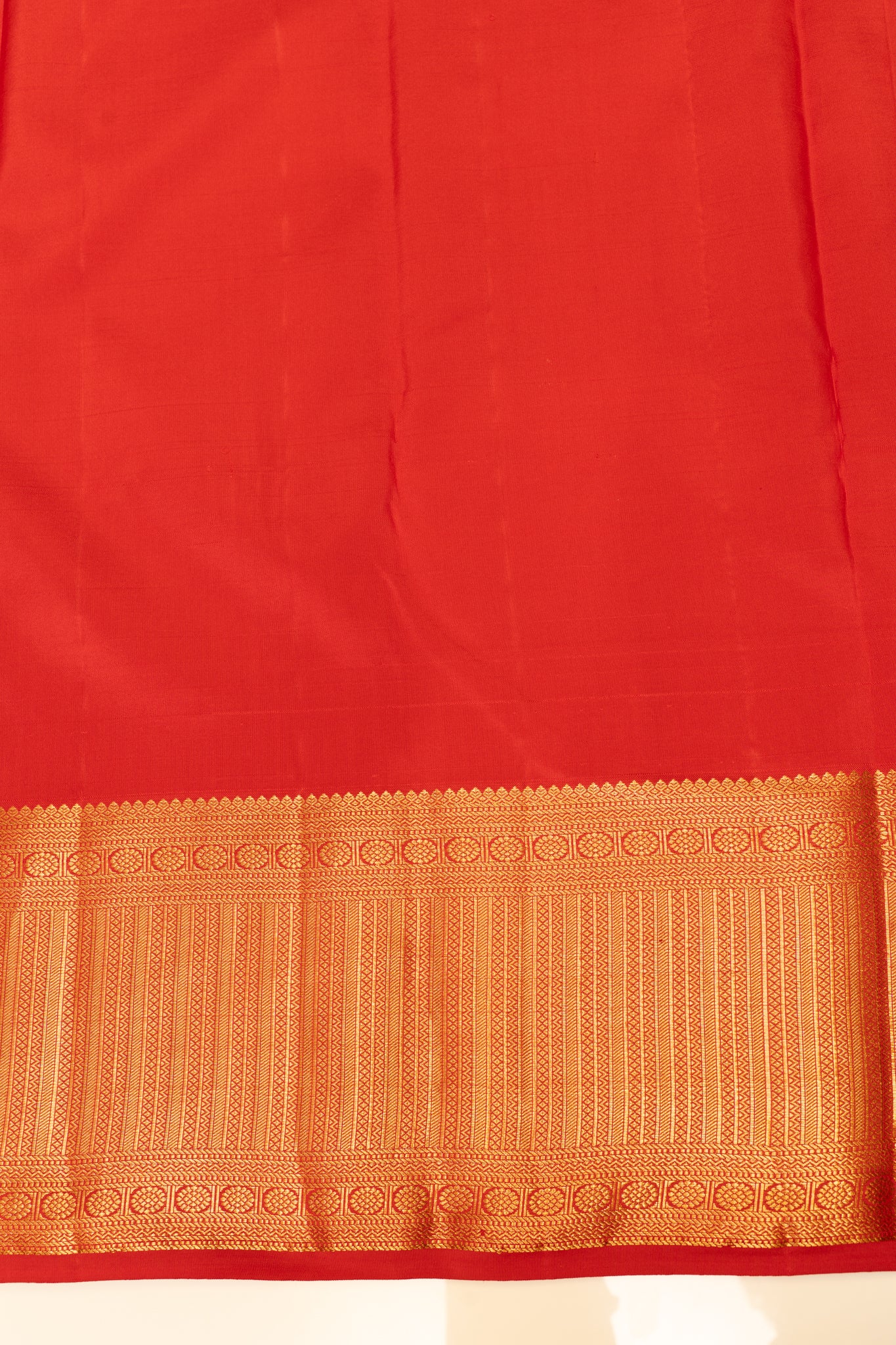 Reddish orange chakram brocade pure Kanchipuram silk saree