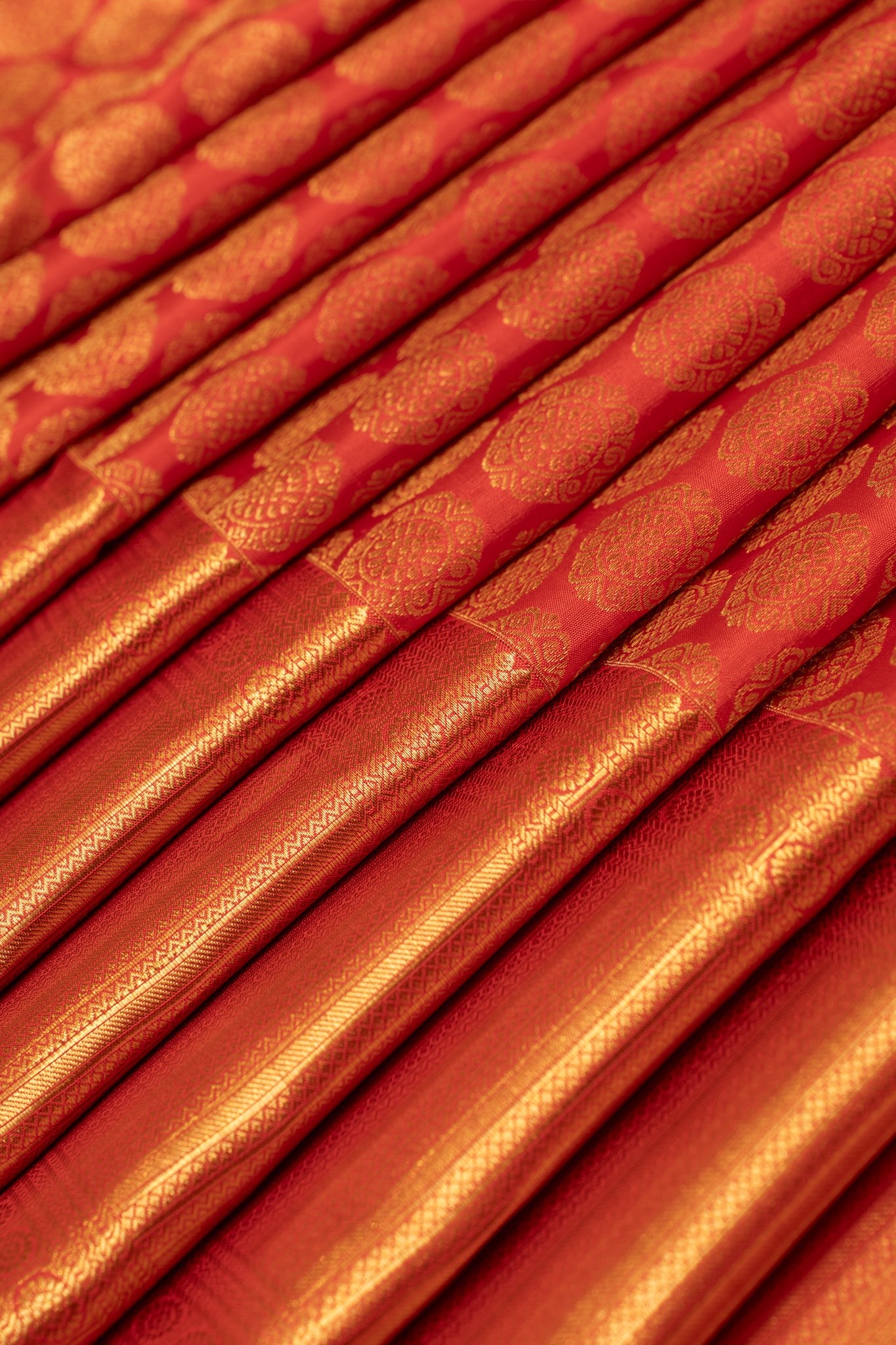 Reddish orange chakram brocade pure Kanchipuram silk saree