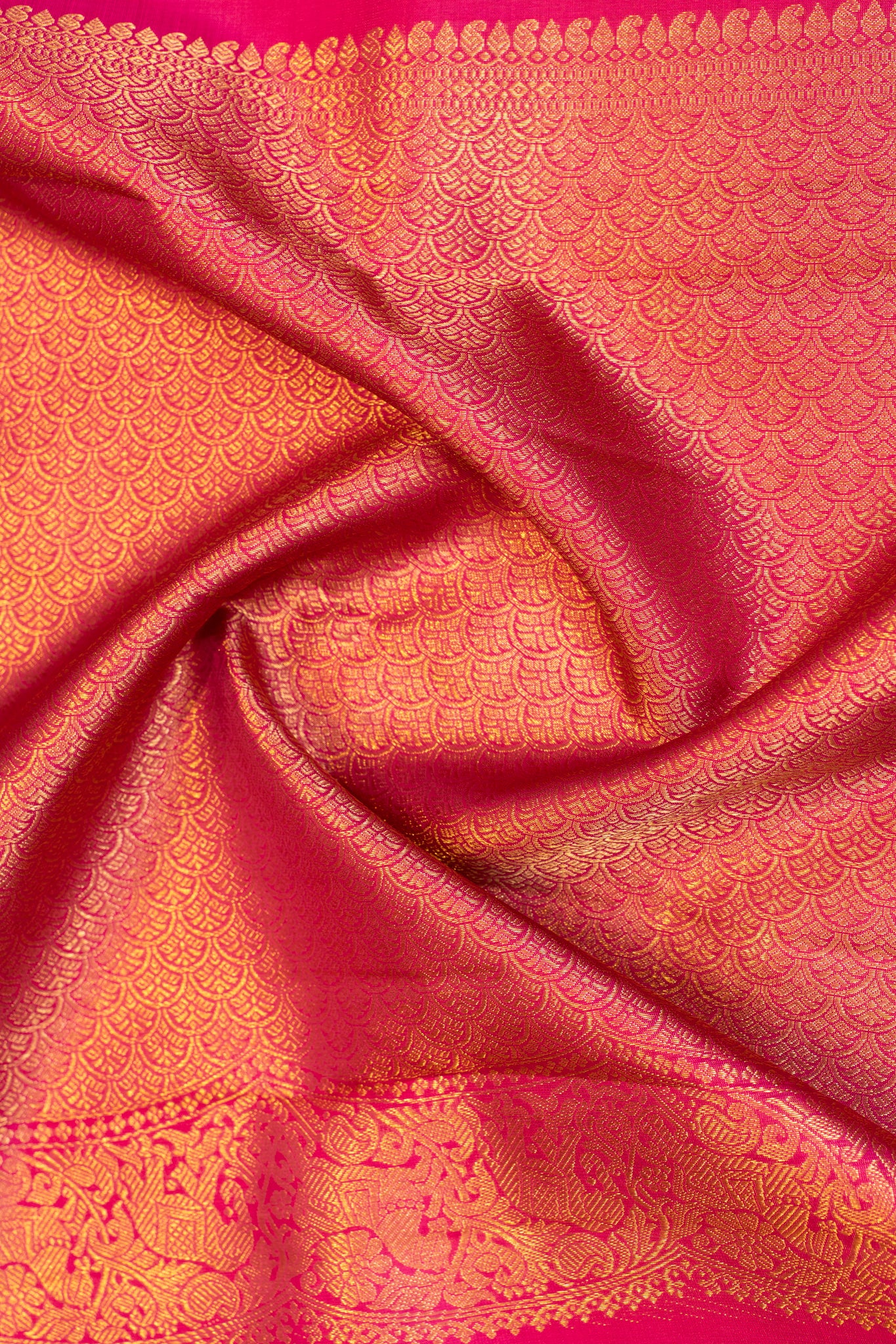 Ivory and magenta turning border pure zari Kanchipuram silk saree