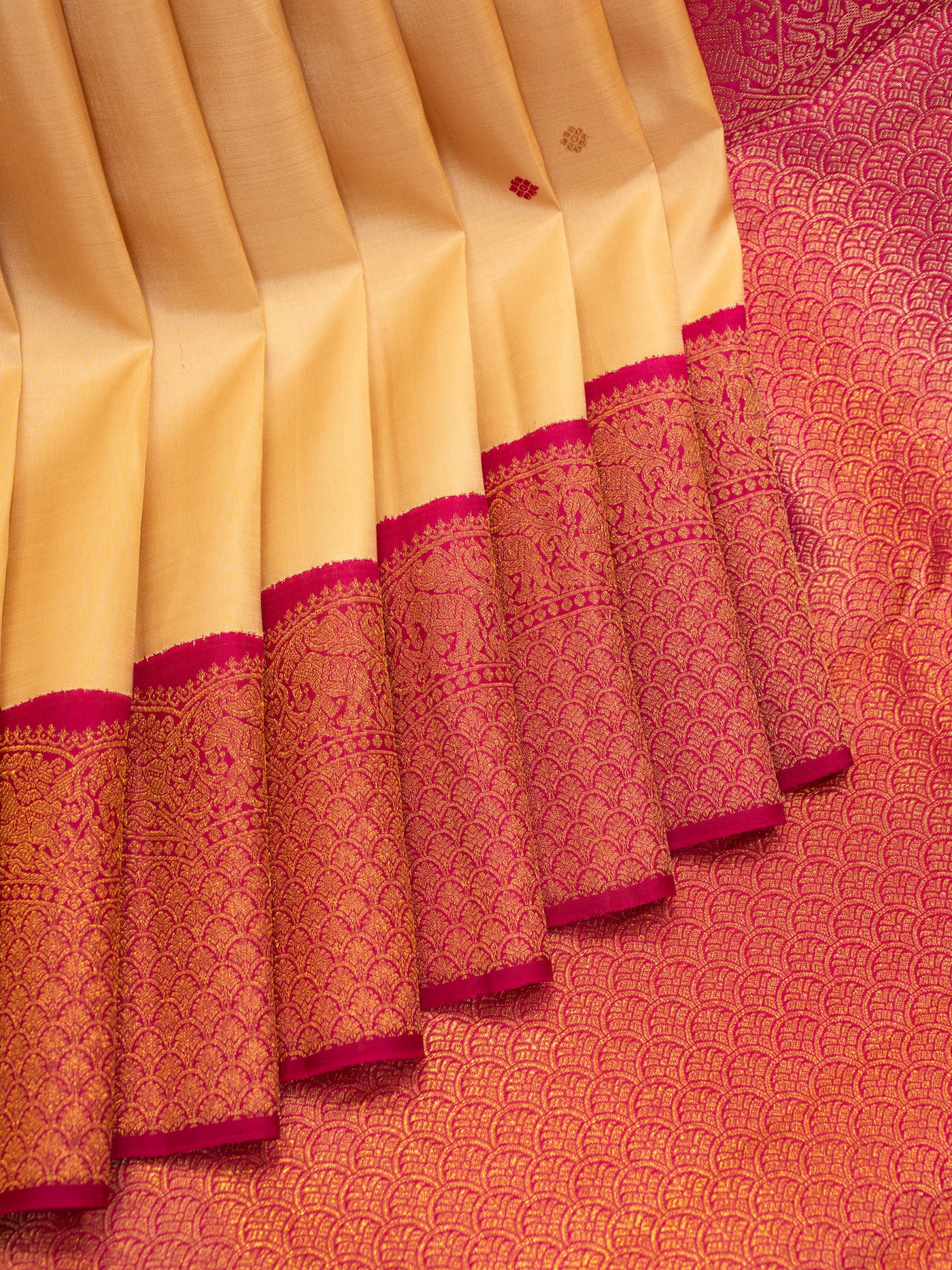 Ivory and magenta turning border pure zari Kanchipuram silk saree