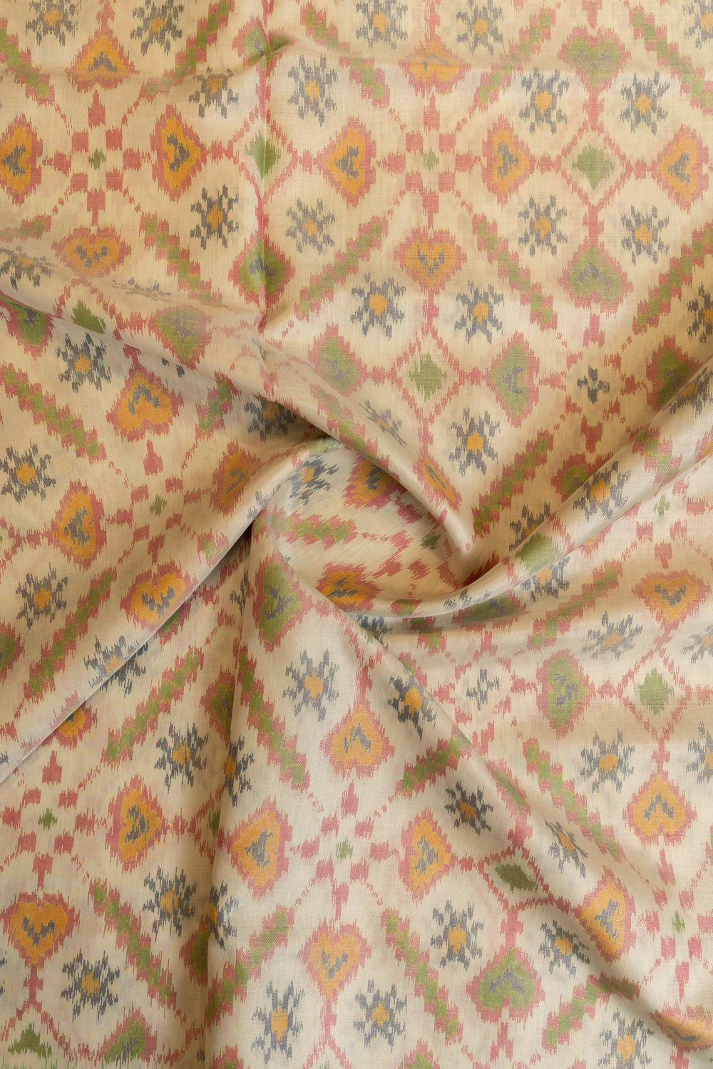 Off white and green patan patola ikat pure silk saree