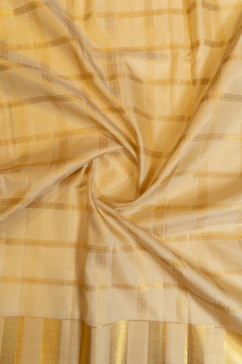 Champagne gold and pink yaazhi checks pure zari Kanchipuram silk saree