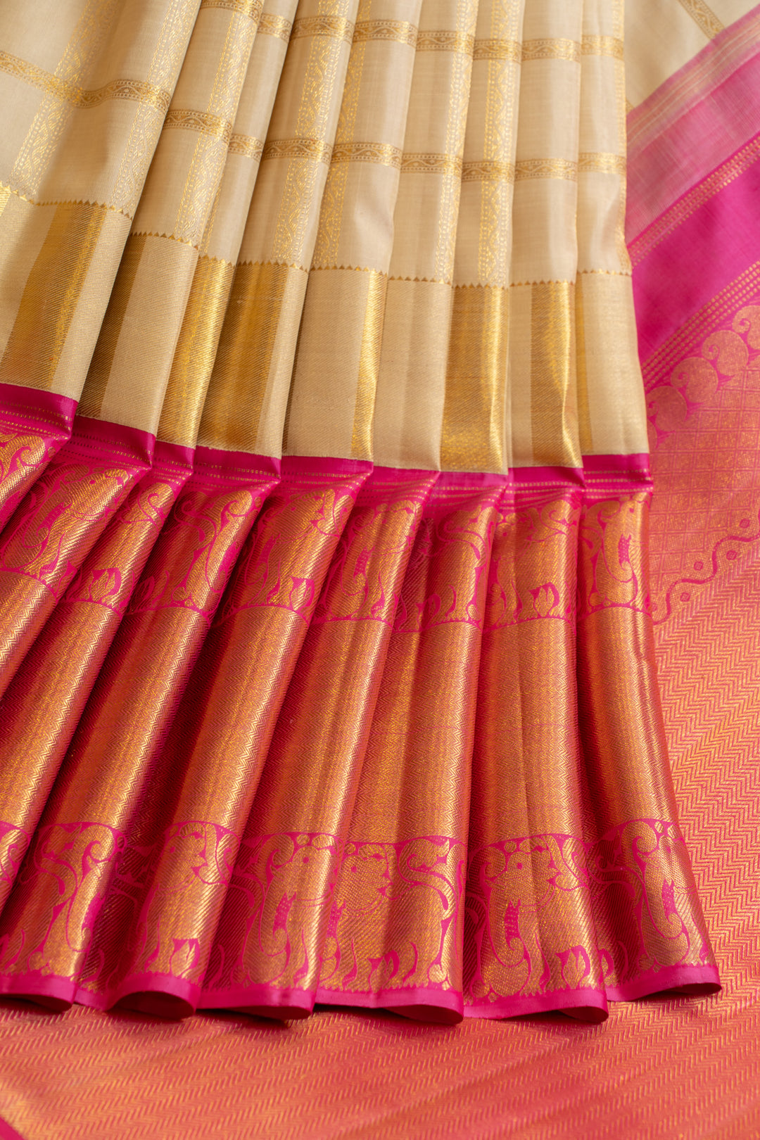 Champagne gold and pink yaazhi checks pure zari Kanchipuram silk saree