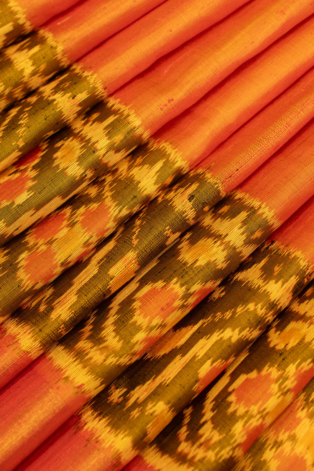 Peach shot colour raw silk pure patola ikat silk saree