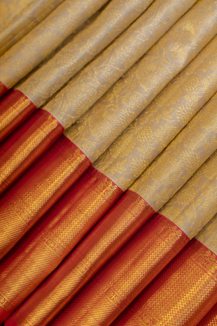 Ivory and peach floral brocade pure Kanchipuram silk saree
