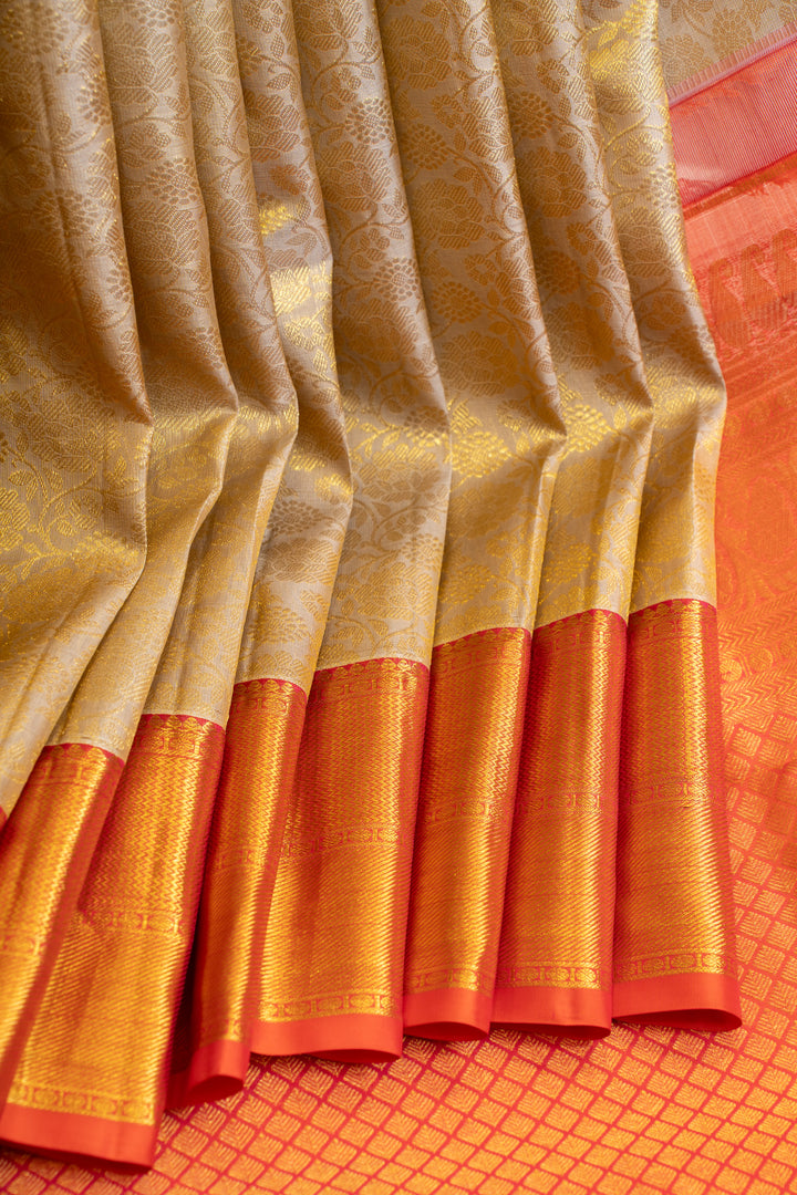 Ivory and peach floral brocade pure Kanchipuram silk saree