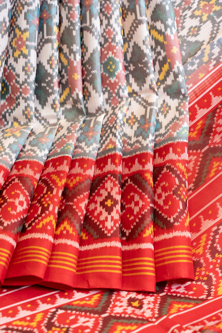 Cream and red pure ikat patan patola silk saree