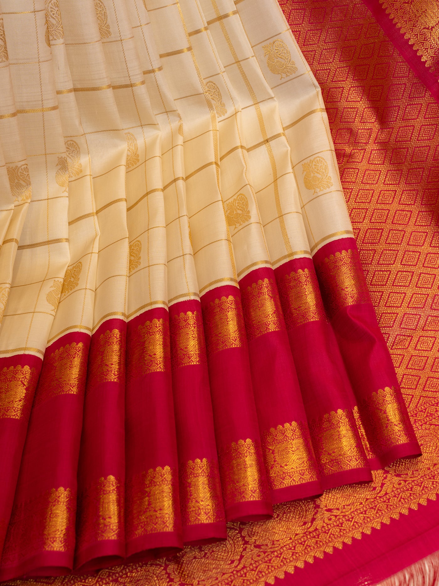 Pearl white and magenta pure zari Kanchipuram silk saree