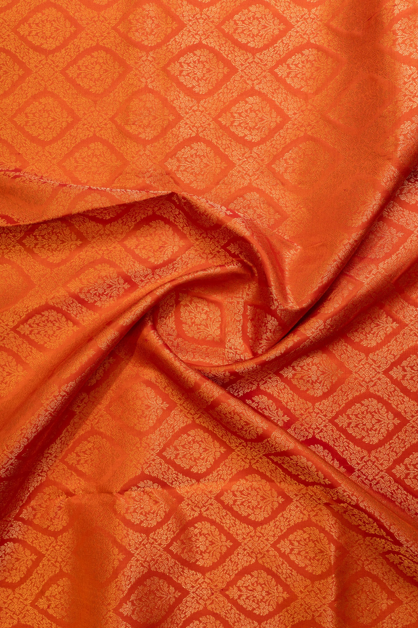 Rust orange diamond brocade pure Kanchipuram silk saree