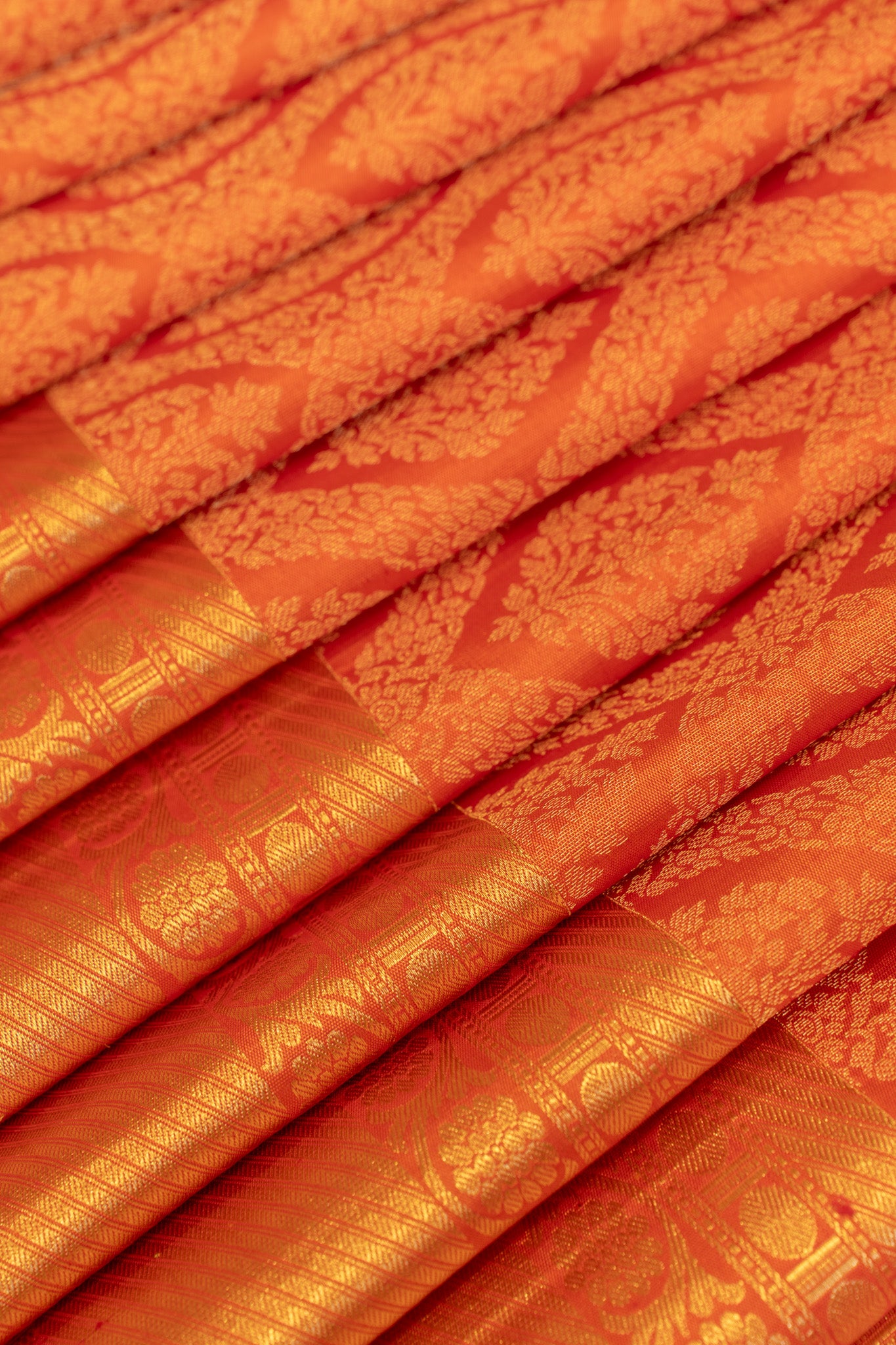 Rust orange diamond brocade pure Kanchipuram silk saree