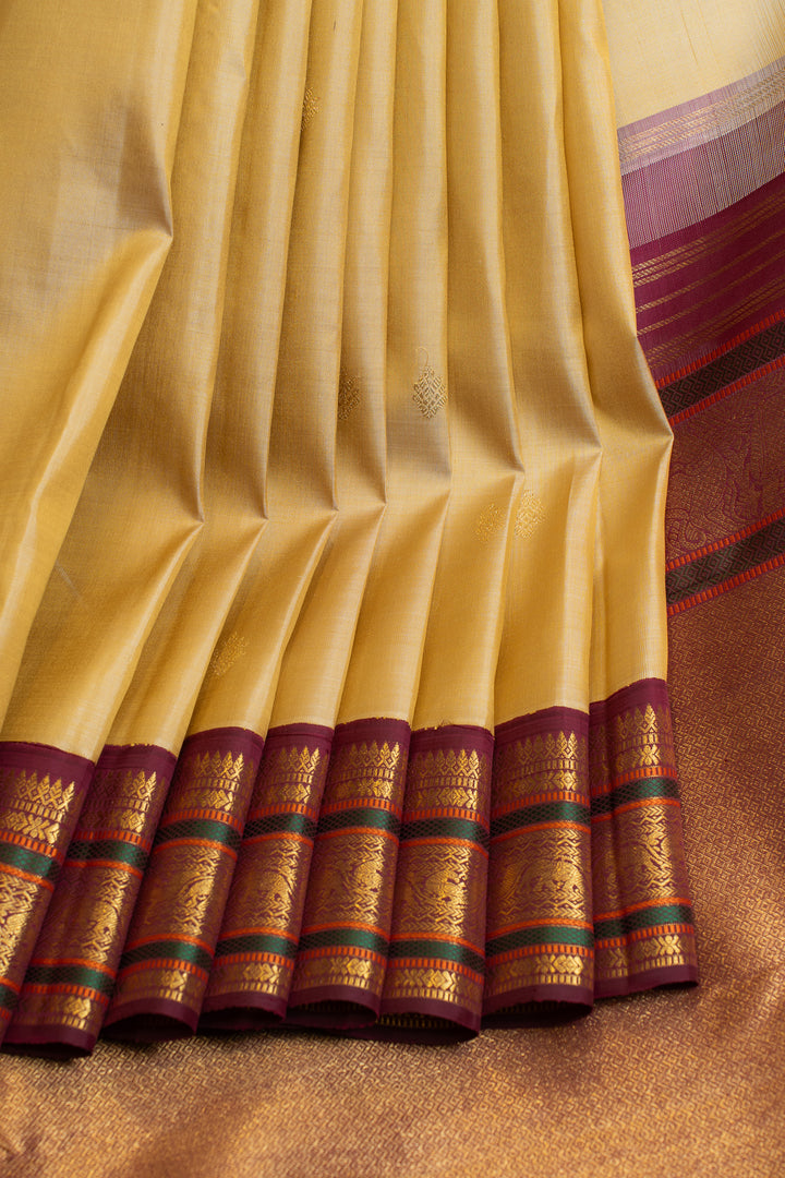 Magnolia cream and maroon pure Kanchipuram silk saree