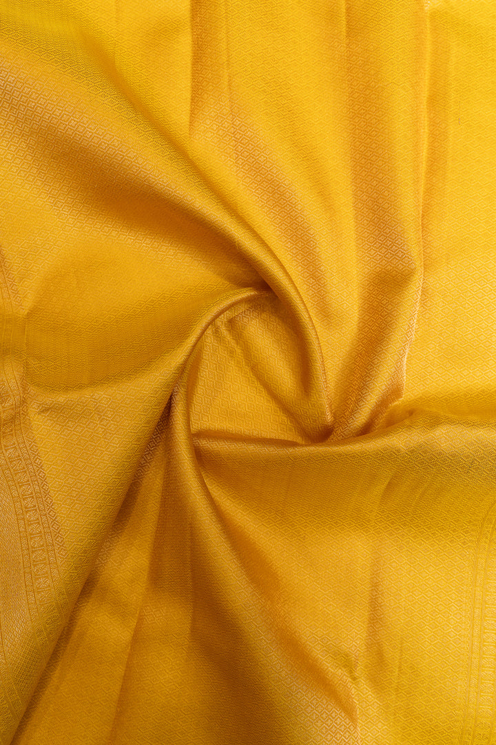 Golden yellow pure Kanchipuram silk saree
